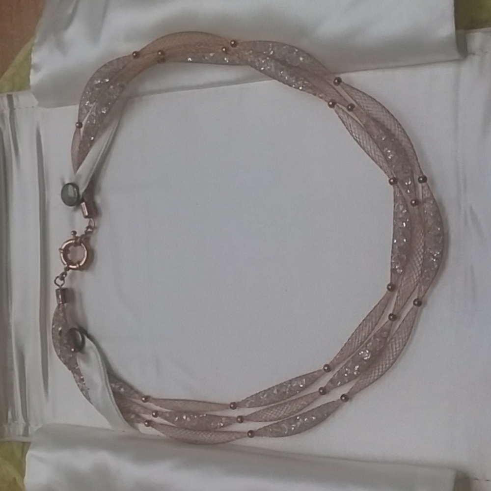 Necklace made out of wiring mesh and crystals